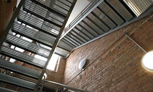 Photo of the modern staircase at the Atkins Building