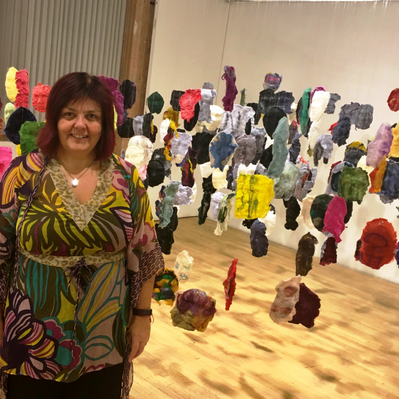 A photo of 'Artist Penny Andrews with her work' by Penny Andrews