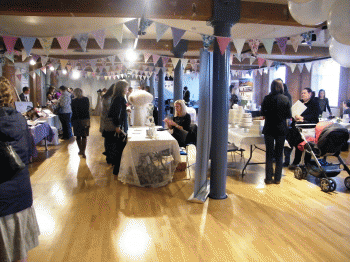 Visitors enjoying the Wedding Fair in the Partridge Suite at Atkins Building